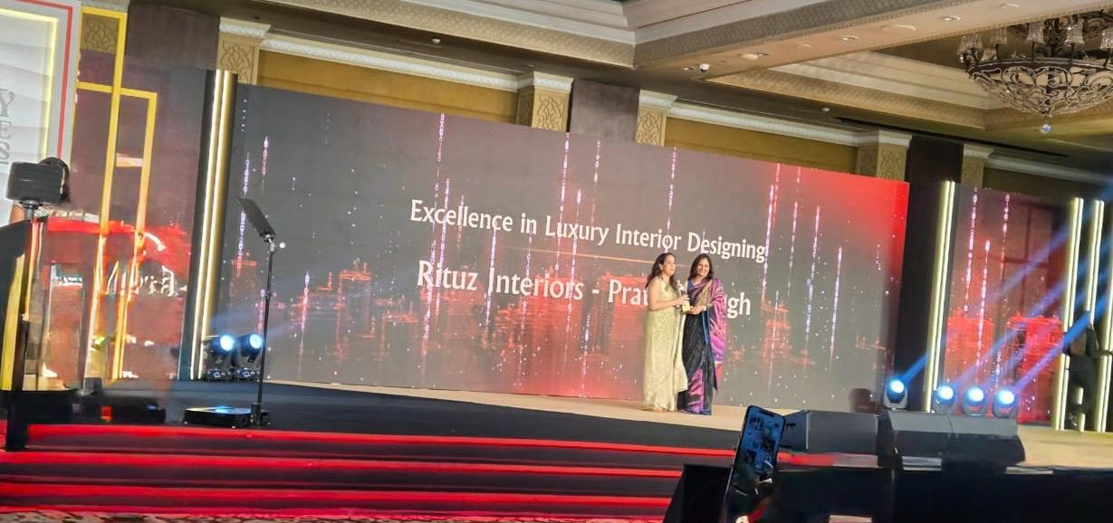 Stage presentation for Excellence in Luxury Interior Designing to Rituz Interiors and Pratima Singh at ET NOW Realty Conclave and Awards 2025