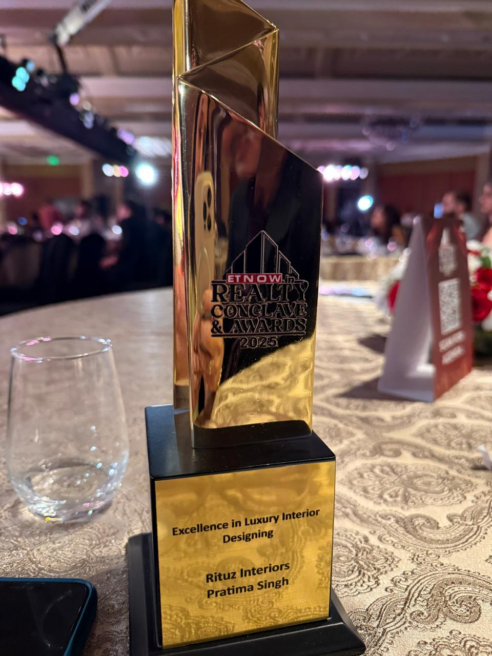 ET NOW Realty Conclave and Awards 2025 trophy for Excellence in Luxury Interior Designing presented to Rituz Interiors and Pratima Singh