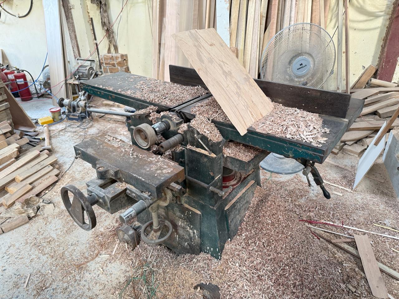 Carpenter operating panel cutting machinery